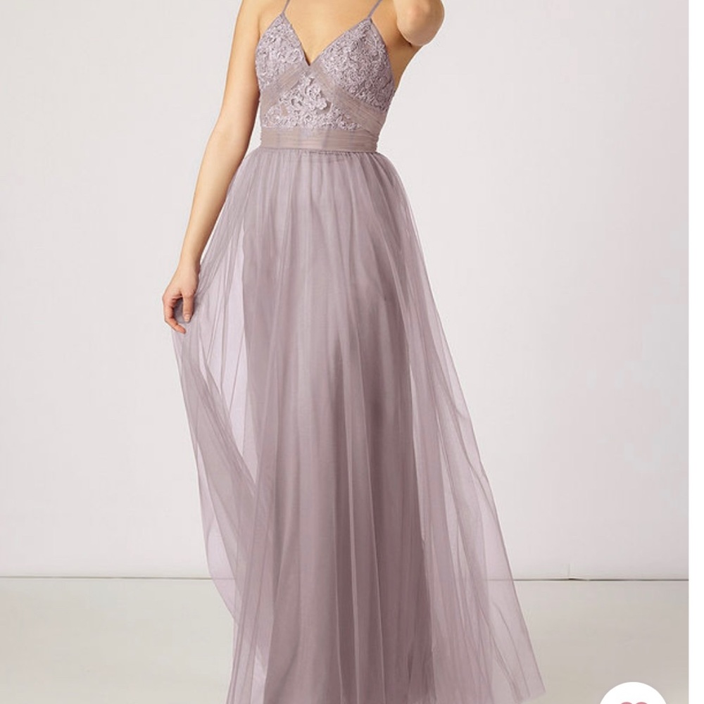 Beautiful champagne colored gown worn in wedding.
